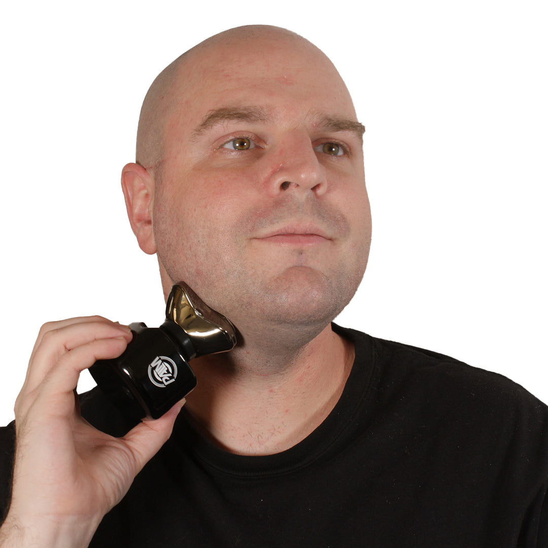 a man using Pitbull Silver PRO for superior shaving experience